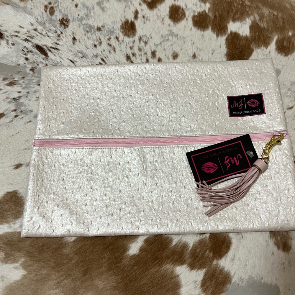 NWT Makeup Junkie size large Pink Textured Clutch Bag